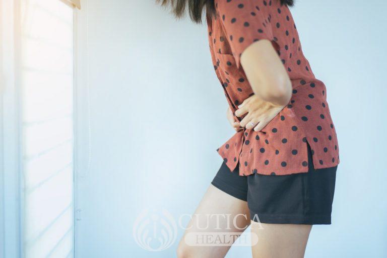 woman-hand-holding-on-stomach-suffering-from-abdominal-pain-female-with-having-menstrual-period_t20_986OYN-768x513